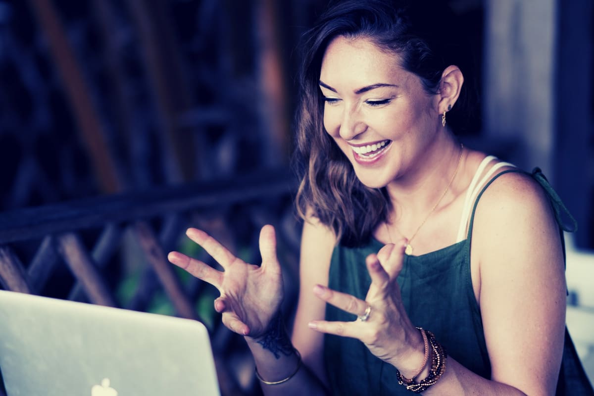Ashlie Walker talking animatedly during an online call